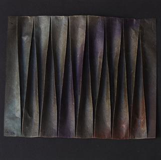 Twisted pleats. Encaustic on paper, folding.